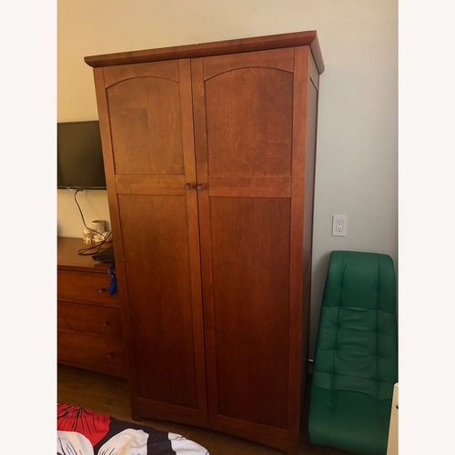 Used Crate & Barrel Wood Armoire for sale on AptDeco