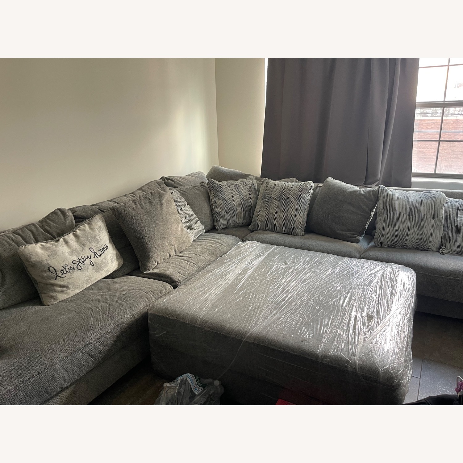 Raymour & Flanigan Light Gray Sofa With Ottoman - image-1
