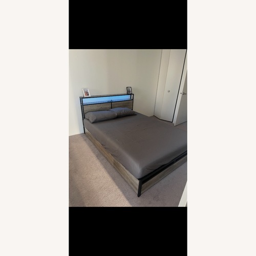 Used Wayfair Queen Bed Frame with Drawers  for sale on AptDeco