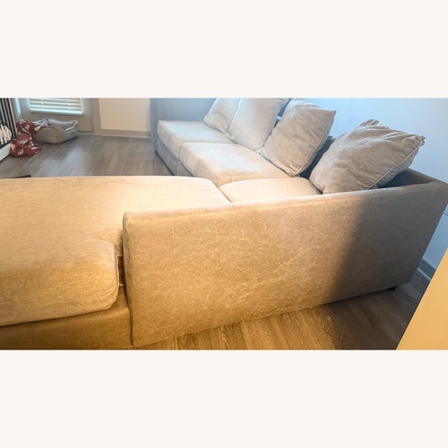 Used Rooms To Go  Natural 2 Piece Sectional for sale on AptDeco