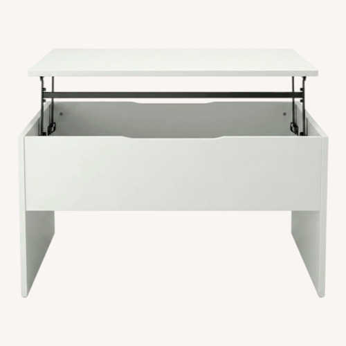 Used IKEA Ostavall Adjustable Coffee Table for sale on AptDeco
