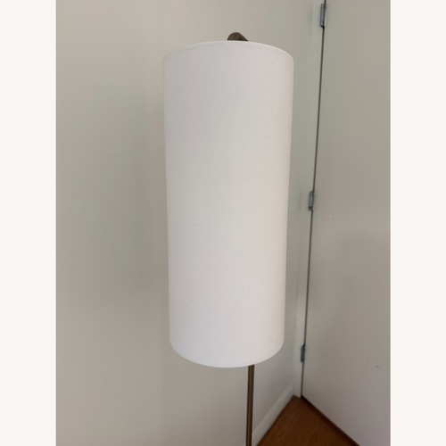 Used Safavieh White Metal Floor Lamp for sale on AptDeco
