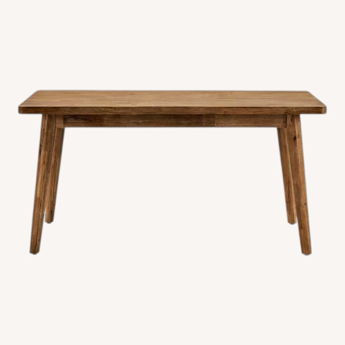 Used Castlery Light Brown Wood Dining Table for sale on AptDeco