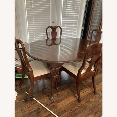 Used Cherryman Industries Cherry wood Dining Set for sale on AptDeco