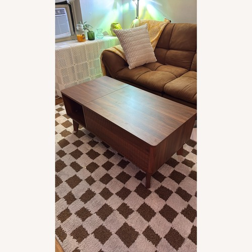 Used Amazon Lift Top Coffee Table with Storage for sale on AptDeco