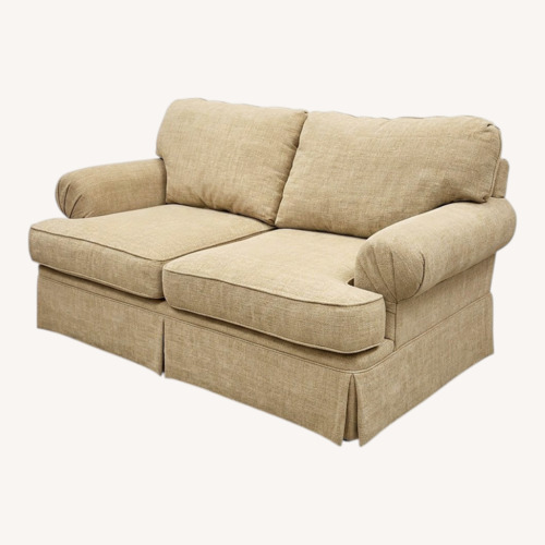 Used Fabric Skirted Roll-Arm Loveseat for sale on AptDeco