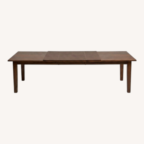 Used Solid Wood Dining Room Table for sale on AptDeco