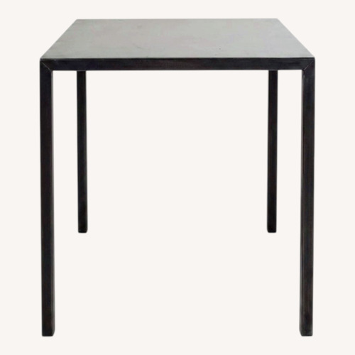 Used ABC Carpet & Home Flatiron Steel Dining Table for sale on AptDeco