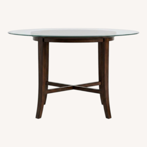 Used Crate & Barrel Glass Top Dining Table Seats 4-6 for sale on AptDeco