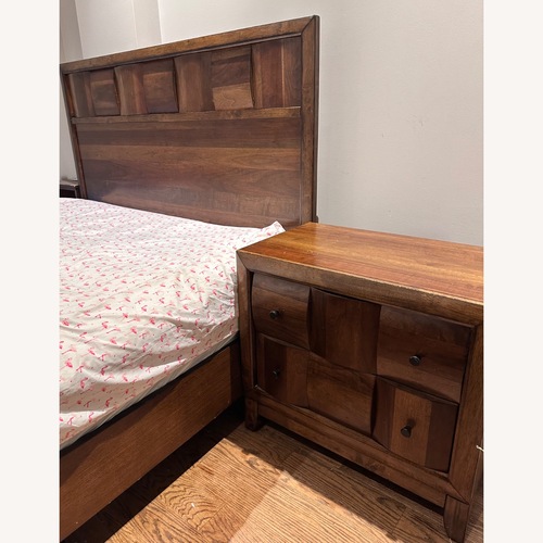 Used Raymour & Flanigan Jovie Dark Brown Wood Queen Bed for sale on AptDeco