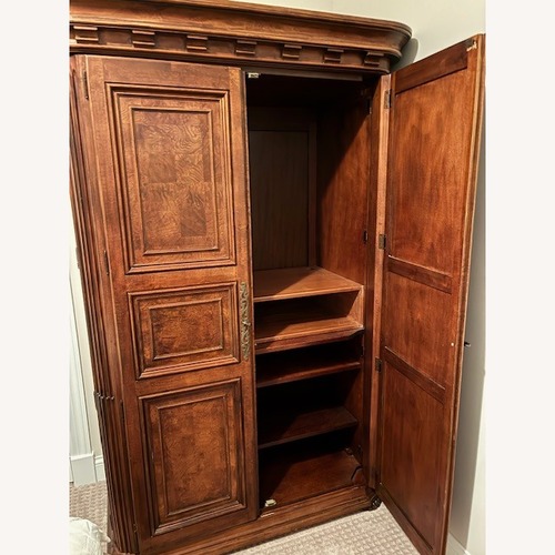 Used Dark Brown Wood Armoire for sale on AptDeco