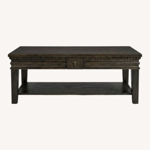 Used Ashley Furniture Miniore Black Wood Coffee Table for sale on AptDeco