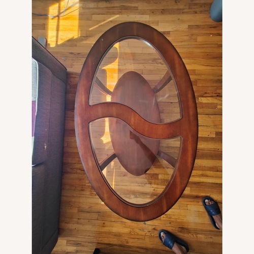 Used Dark Brown Glass Coffee Table for sale on AptDeco