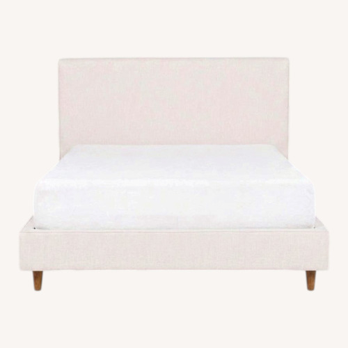 Used Living Spaces King Sand Upholstered Bed for sale on AptDeco