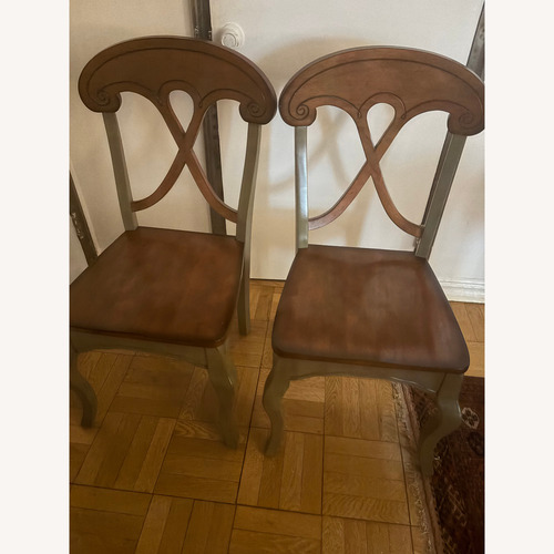 Used Pier 1 Imports Dark Brown Dining Chair for sale on AptDeco
