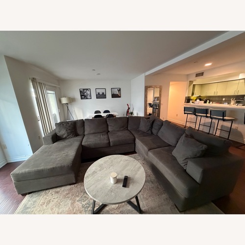 Used Living Spaces Dark Gray 3+ Piece Sectional for sale on AptDeco
