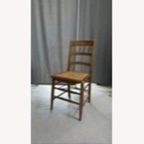 Used Wooden Side Dining Chair Cane Seat Spindle Back  for sale on AptDeco