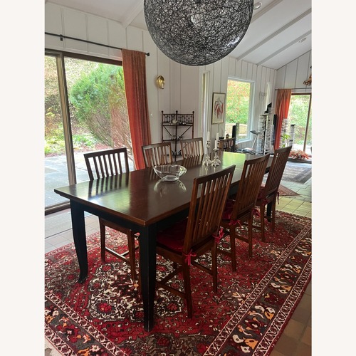 Used Dark Brown Wood Dining Set for sale on AptDeco