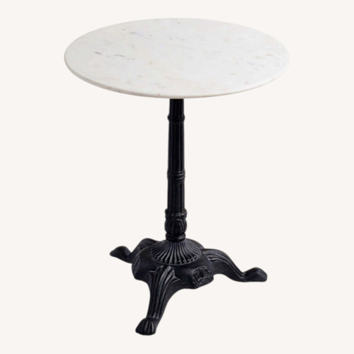 Used World Market Black & White Marble Parisian Bistro Table for sale on AptDeco