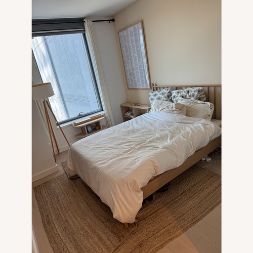 Used Article Lenia Natural Wood Queen Bed for sale on AptDeco