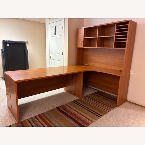 Used Dark Brown Wood Veneer Desk for sale on AptDeco