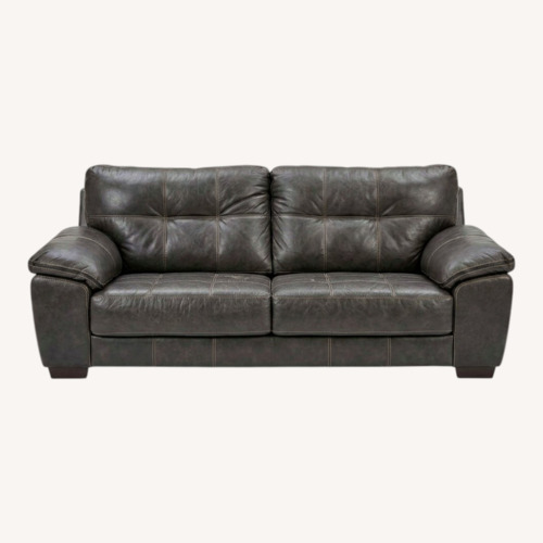 Used Ashley Furniture Dark Gray Leather 2 Seater Sofa for sale on AptDeco