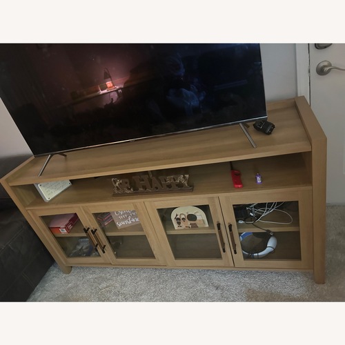 Used Wooden Entertainment Center With Doors for sale on AptDeco