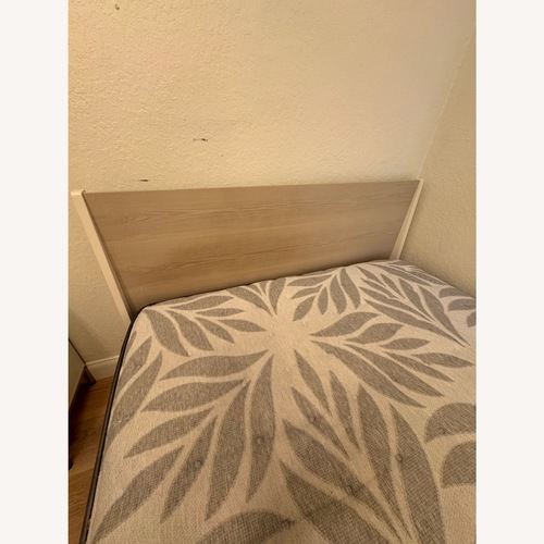 Used West Elm Natural Wood Queen Bed for sale on AptDeco