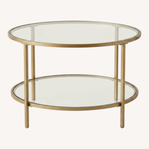 Used Amazon Round Glass Coffee Table for sale on AptDeco