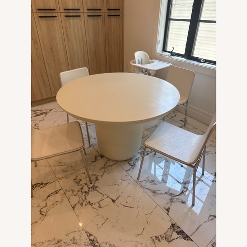 Used CB2 Lola White Concrete Dining Table for sale on AptDeco