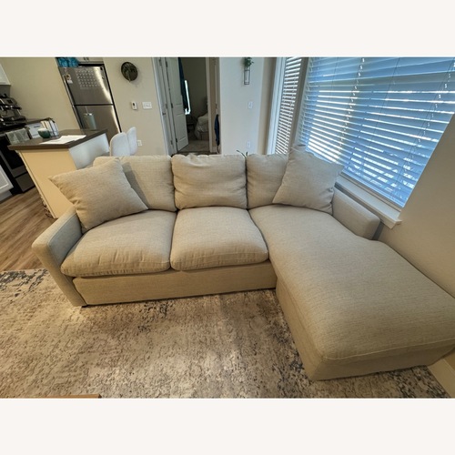 Used Living Spaces Natural Linen 3+ Piece Sectional for sale on AptDeco