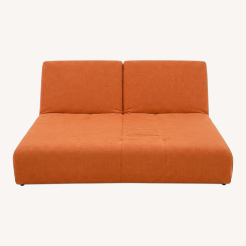 Used Ligne Roset Modular Orange Sofa for sale on AptDeco