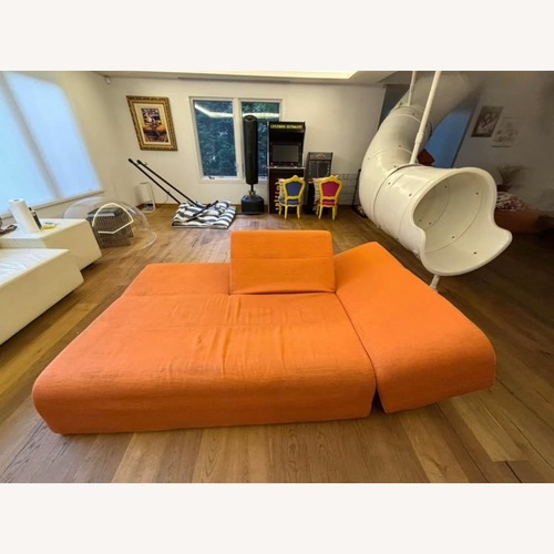 Used Ligne Roset Modular Orange Sofa for sale on AptDeco