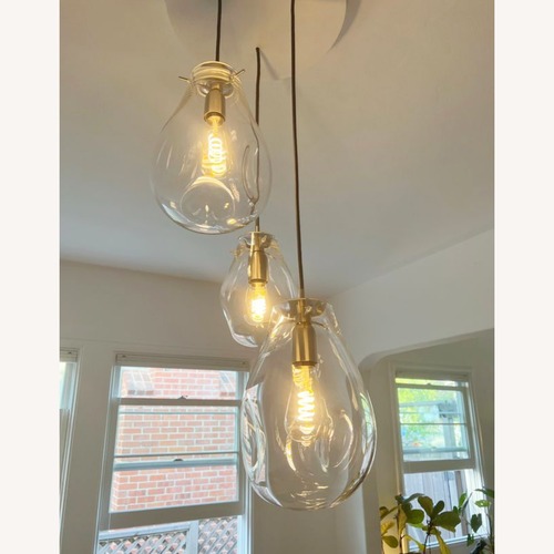 Used Bomma Tim Hand-Blown Clear Glass Pendant Lights for sale on AptDeco