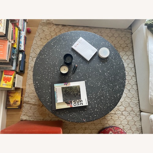 Used CB2 Terrazzo Black Round Coffee Table 35.5" for sale on AptDeco
