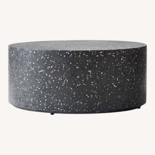 Used CB2 Terrazzo Black Round Coffee Table 35.5" for sale on AptDeco