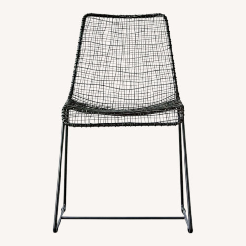 Used CB2 Reed Black Metal Dining Chairs (set of 6) for sale on AptDeco