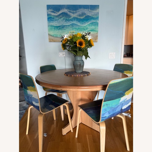 Used Anthropologie Sanne Natural Wood Dining Table for sale on AptDeco