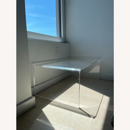 Used CB2 Transparent Coffee Table for sale on AptDeco