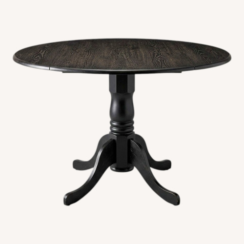 Used Round Black Drop-Leaf Kitchen Table (Wood) for sale on AptDeco