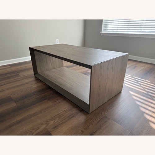 Used Light Brown Wood Coffee Table for sale on AptDeco