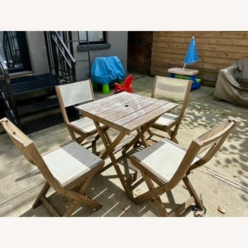 Used West Elm Portside Patio Table and Chairs for sale on AptDeco