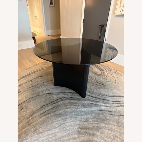 Used Smoked Black Glass Dining/Entranceway/Foyer Table for sale on AptDeco