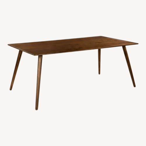 Used Article Seno Dark Brown Wood Dining Table for sale on AptDeco