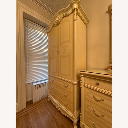 Used Homey Natural Wood Armoire for sale on AptDeco
