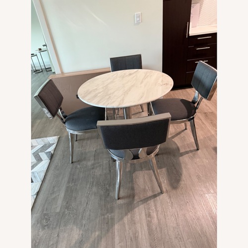 Used Jordan's Furniture Modern Round Marble-Top Dining Set for sale on AptDeco