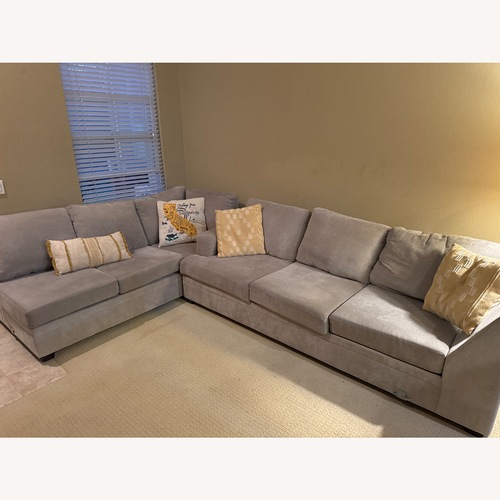 Used Living Spaces Light Gray 2 Piece Sectional for sale on AptDeco