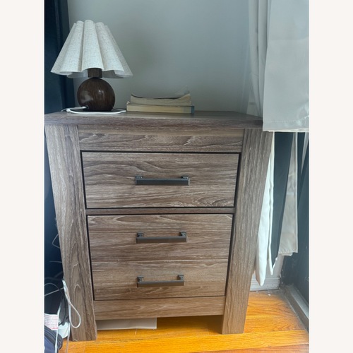 Used Ashley Furniture Zelen Natural Wood Nightstands for sale on AptDeco