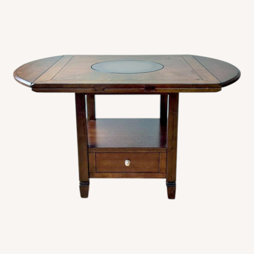 Used Dark Brown Wood Dining Table for sale on AptDeco