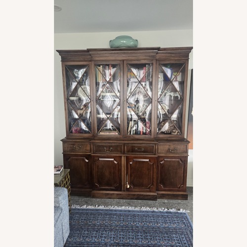 Used Vintage/Antique Dark Brown Wood Breakfront for sale on AptDeco